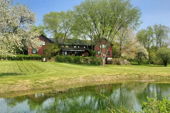 The Old Orchard Home surrounded by a small apple orchard, large meadows, and a private pond - Image 1